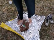 Crush of Easter egg in barefoot