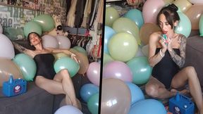 Preparing for a Balloon Party, surrounded by Balloons - Mishel Looner balloons