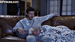 Horny busted granny pleasing cock on couch