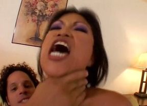 Nasty asian MILF gets on her knees to suck dudes hard cock before getting fucked