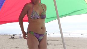 Latina mom shows off on the beach and masturbates deliciousl