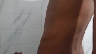 Indian boy displaying his genitals and ejaculating