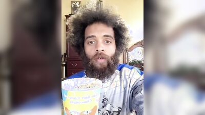 Lovely guy with a cute beard does a food review