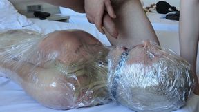 Cute Tranny wrapped in plastic! Spanking! Cumshot in her mouth! Used til she cums!