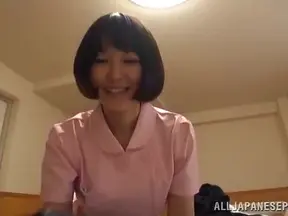 Japanese Nurse Delivers Seductive Footjob Handjob Combo