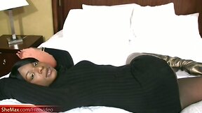 Cute and feminine black tranny strips off and shows big butt