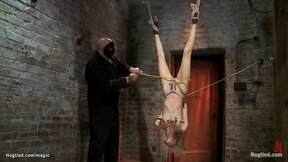 Skinny blond in upside down suspension