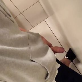 boy jerks off big cock under stall a random guy in the cabin next door