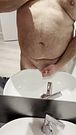 Quickie small penis jerking off in the hotel sink
