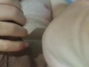 young man touches his penis