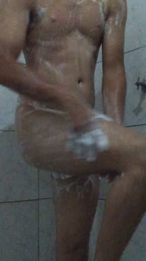 Taking a shower after shaving her body, soaping herself all over and getting a hard cock showing off her body