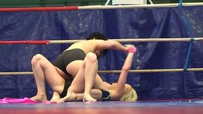 Slim and sweaty girl Paige Fox knocks down her wrestling opponent