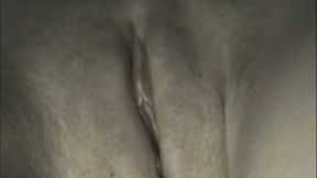 My horny wife entertains herself by fingering her shaved pussy