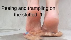 Peeing and trampling on the stuffed 1