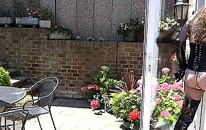 Sexy Transvestite in Thigh Boots wanking in the garden
