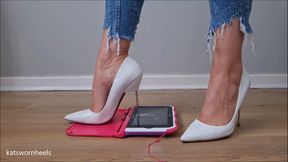 Kat Crushes a Tablet Under Her Sharp White Metal Stilettos