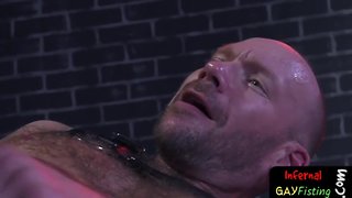 Fisted hunk is turned inside out and bareback