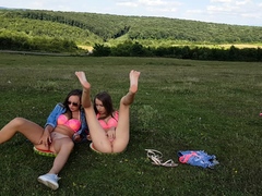 Small titted lesbians from Holland have fun outdoors