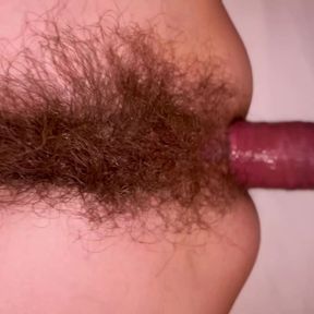 Slim super hairy MILF does anal and squirts a lot