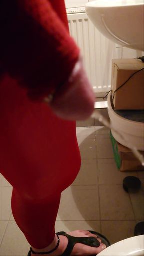 Pissing at Home in Red Legging with Penis Sleeve