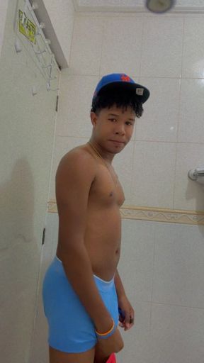 Muscular Young Man Strips Naked Before the Shower