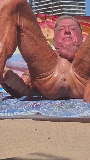 Key West oiled up using his new huge dildo at the beach