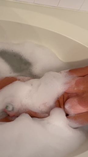 Dianne Fox in the tub with a cucumber.   Clip 1