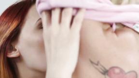 ”Adorable redhead is distracted from her studies by sexy blonde who licks her muff”