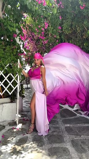 Hot babe shows off her flying dress at a Mykonos beach