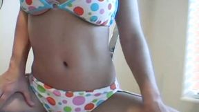 ”Big Boobed blonde bikini teen”