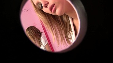 College teen loves giving blowjob at the gloryhole