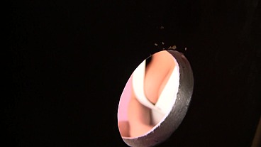 College teen loves giving blowjob at the gloryhole