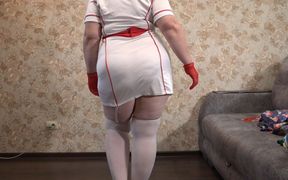 A Mature Wife Is Getting Ready for a Christmas Party and Trying on a Nurse's Uniform. Does She Want to Get Fucked There? PAWG.
