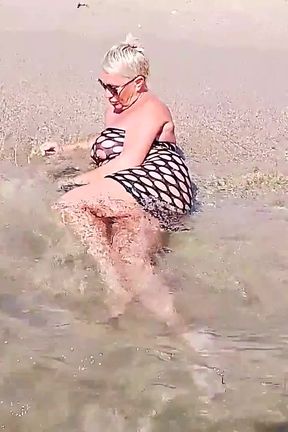 Stranger Looking on Me in the Beach