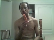 BLACK GAY STICKS CARROT IN ASS AND EATS IT