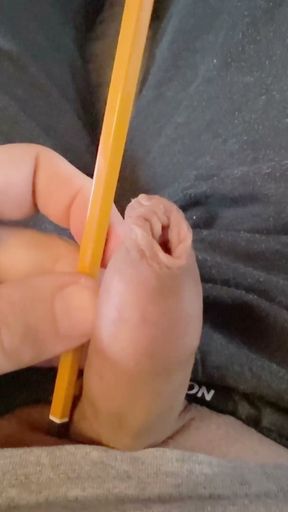 Play with the foreskin of my little cock and a pencil   Clip 2