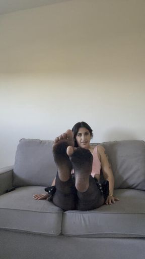 Feet in fishnets