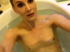 Busty amateur milf masturbates in the shower