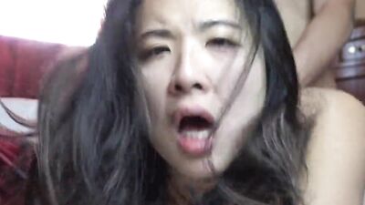 Skinny Asian chick takes a pounding after gagging on a huge white cock
