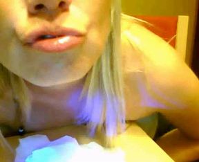 Teeny blondie flirts with me on webcam flashing her boobs