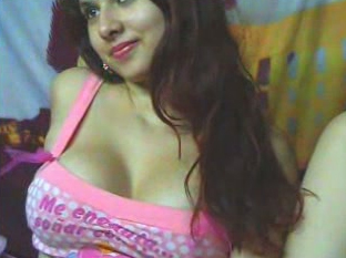 Super cute redhead latina webcam chick teases me with her cleavage