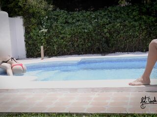 Having pleasure in a pool of a swinger club!!