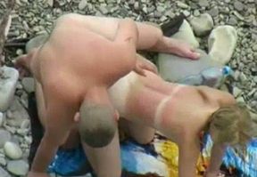 Cute blonde married lady having sex on the nude beach