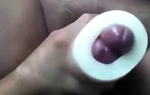 Buddies using a cock sleeve together with nice cumshots