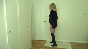 Little black dress, latex boots and fishnets