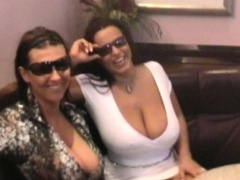 Hot babes Aneta and Kora flash their wonderful big tits on the street