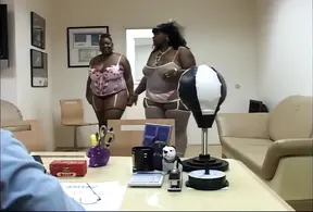 Two huge beefy men service black cock in a throesome threeway
