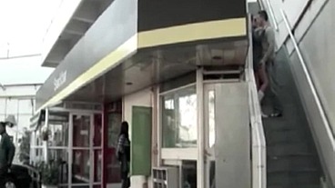Transgender prostitutes service in a public gas station