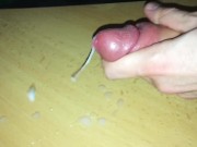 Pulling my foreskin and cumming hard in slow motion while massaging my frenulum