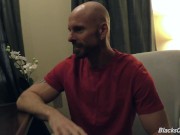 Black doctor removing something from the ass of a white guy